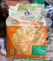 Annie'S Organic Cheddar Cheesy Smiles. Baked Puffed Corn Product Image